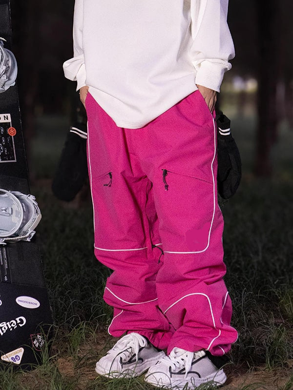 Cadenza | Women’s baggy snow pants with reflective detailing and multi-pocket shaping