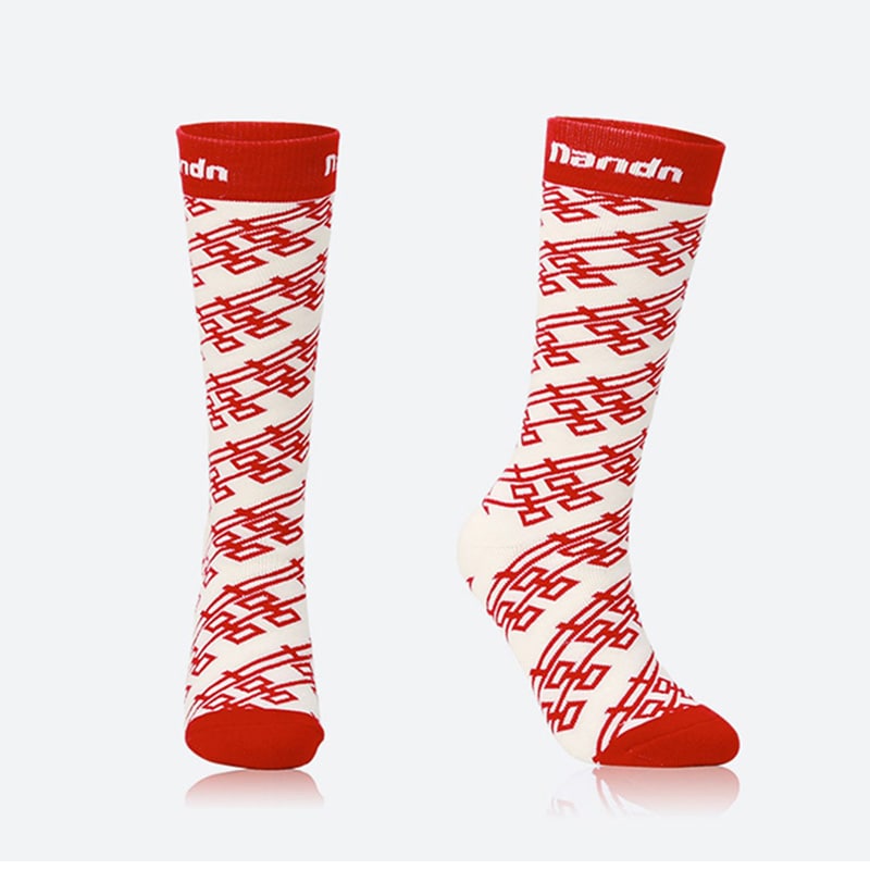 Kelis | Women’s long ski socks with supportive shaping and extended winter coverage