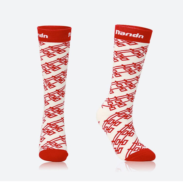 Kelis | Women’s long ski socks with supportive shaping and extended winter coverage