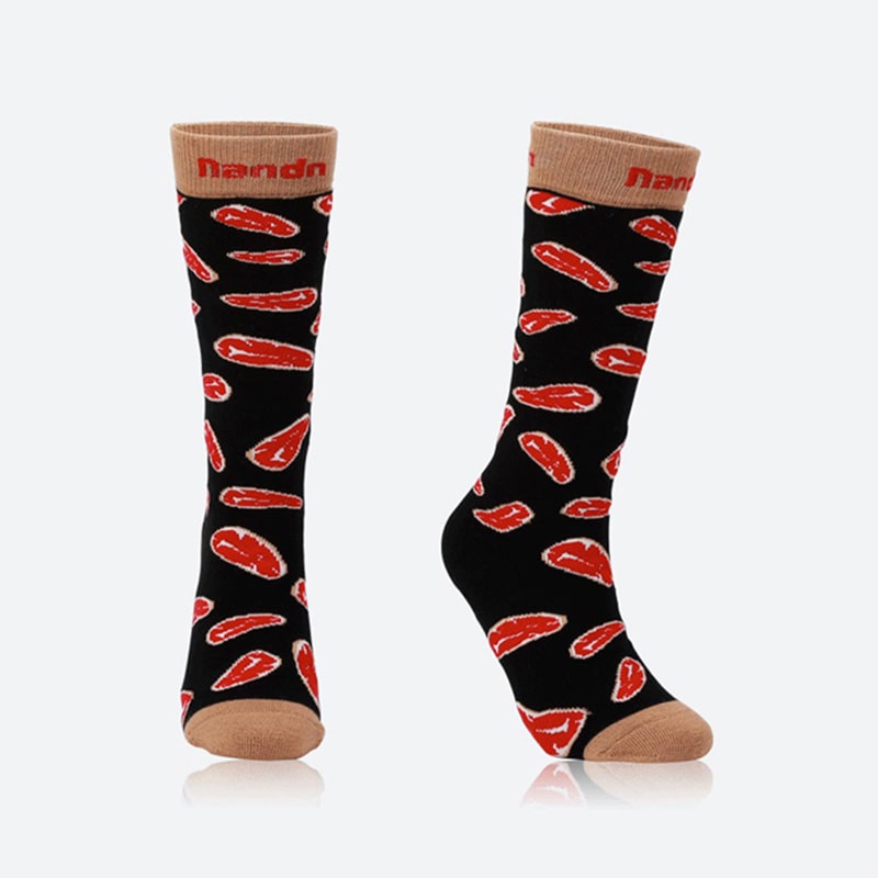 Kelis | Women’s long ski socks with supportive shaping and extended winter coverage