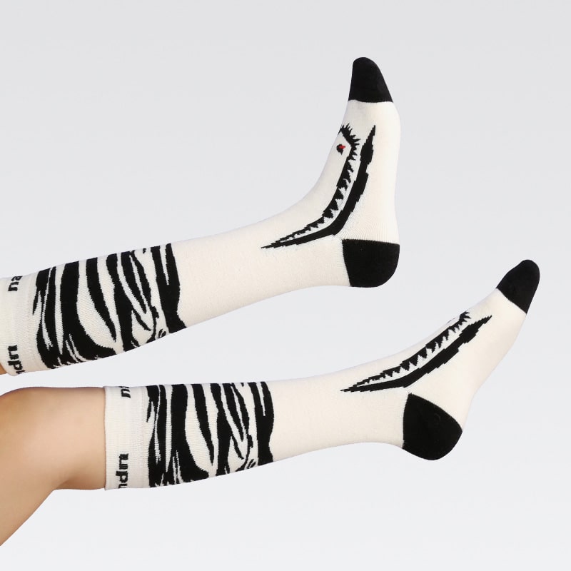 Kelis | Women’s long ski socks with supportive shaping and extended winter coverage