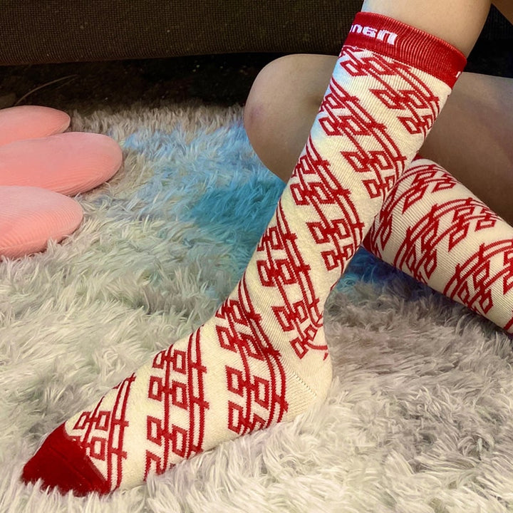 Kelis | Women’s long ski socks with supportive shaping and extended winter coverage