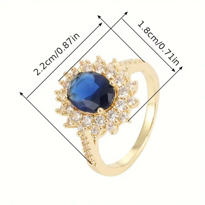 Bonnie | Women’s statement ring with sapphire blue stone and crystal halo design