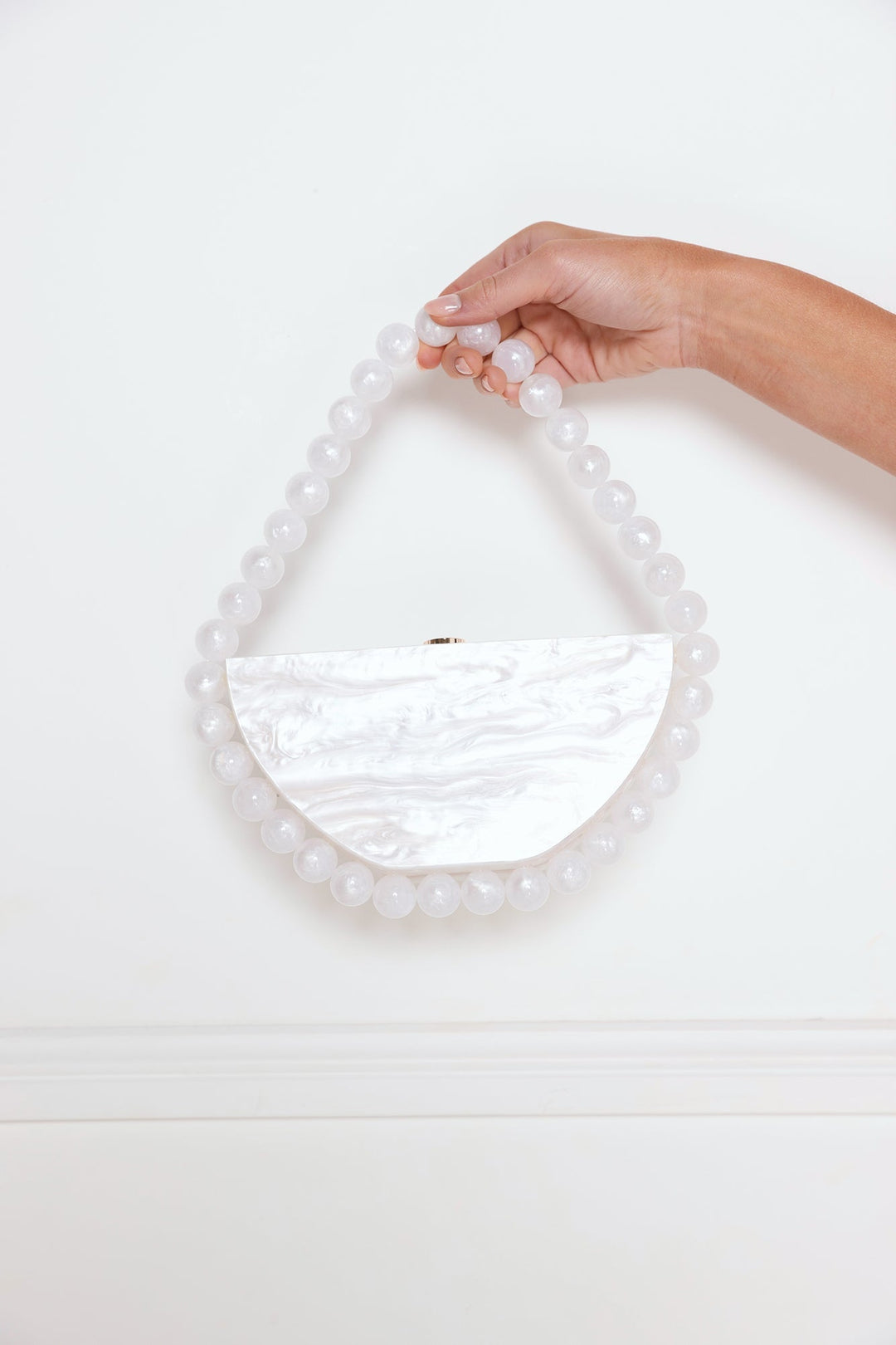 Shanna | Women’s acrylic clutch bag with pearl-like finish and beaded handle
