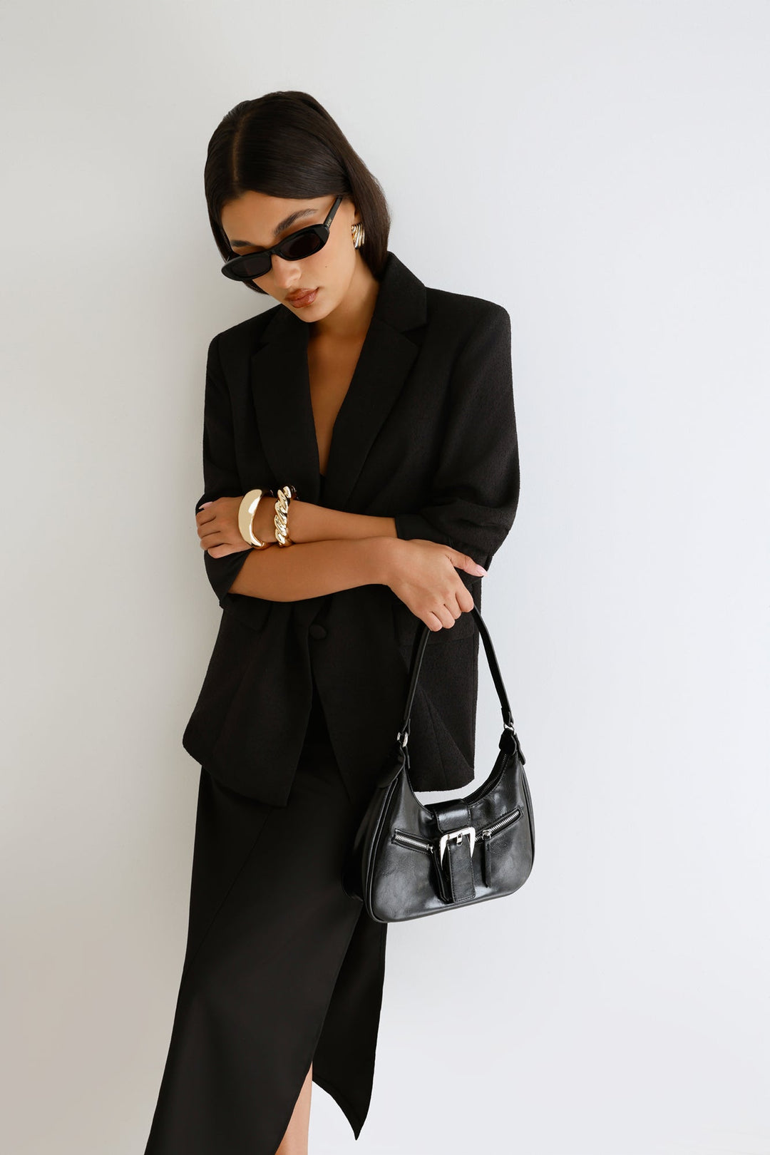 Anamarie | Women’s crescent shoulder bag with buckle detail and zip closure