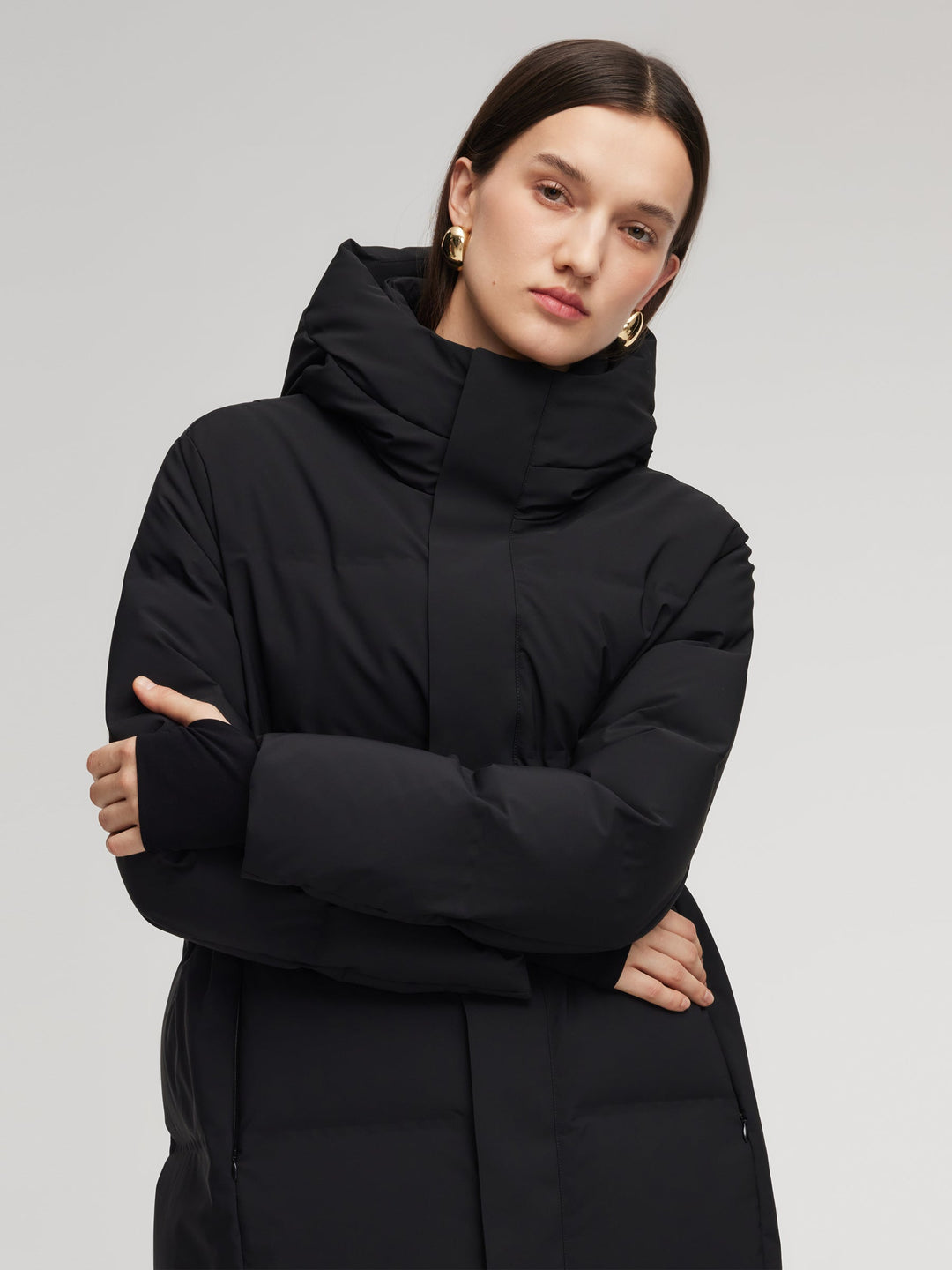 Saelyn | Women’s long hooded winter coat with a streamlined, insulated silhouette