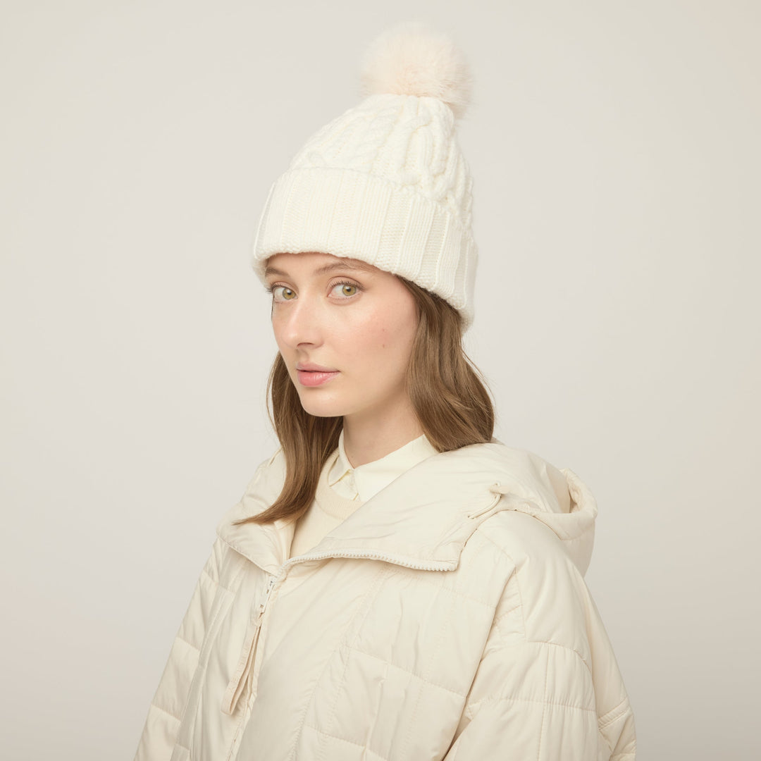 Halynn | Women’s cable knit beanie with a soft pom-pom accent
