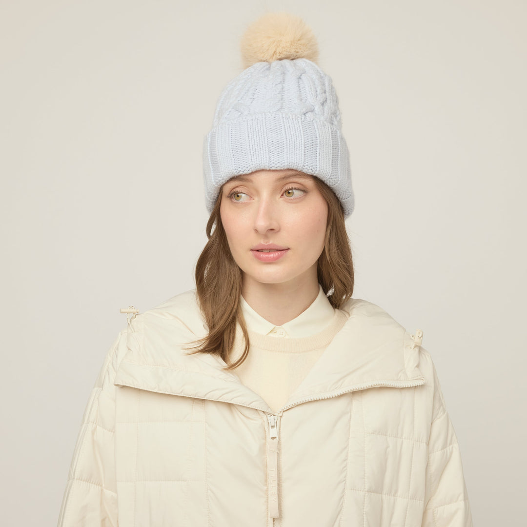 Halynn | Women’s cable knit beanie with a soft pom-pom accent