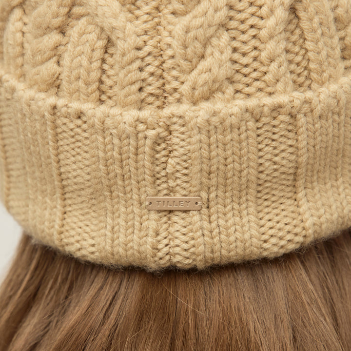 Lirena | Women’s textured cable knit pom beanie with a sculpted cold-season silhouette