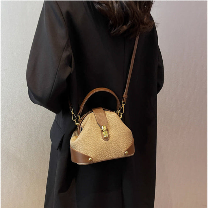 Patty | Women’s compact crossbody bag with contrast detail and top handle