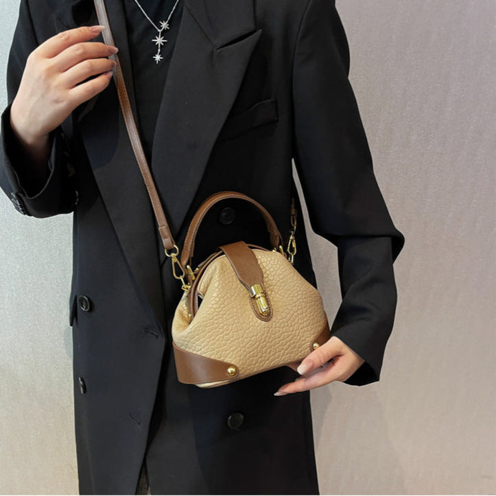 Patty | Women’s compact crossbody bag with contrast detail and top handle