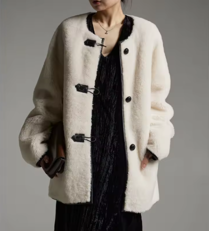 Cyrale | Women’s mid-length sheepskin coat with a structured winter profile