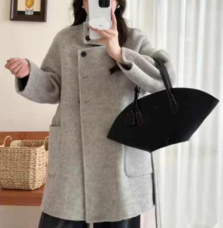 Meyra | Women’s standing-collar wool coat with an asymmetric front and a structured belted profile