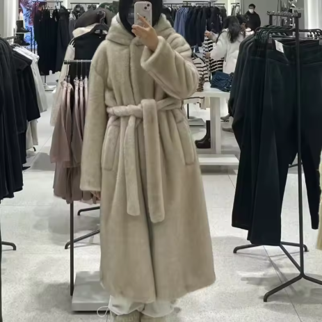 Zyrra | Women’s hooded faux fur long coat with a warm seasonal structure