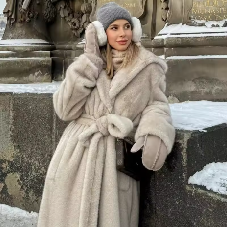 Zyrra | Women’s hooded faux fur long coat with a warm seasonal structure