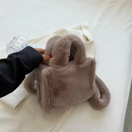 Jorinae | Women’s soft faux fur shoulder bag with a plush seasonal profile