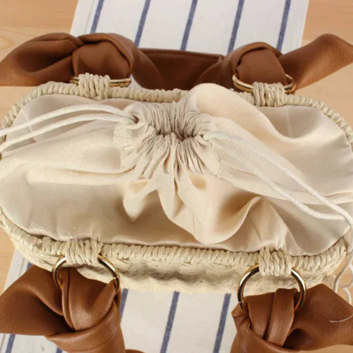 Morgan | Women’s straw handbag with drawstring interior and knotted handle