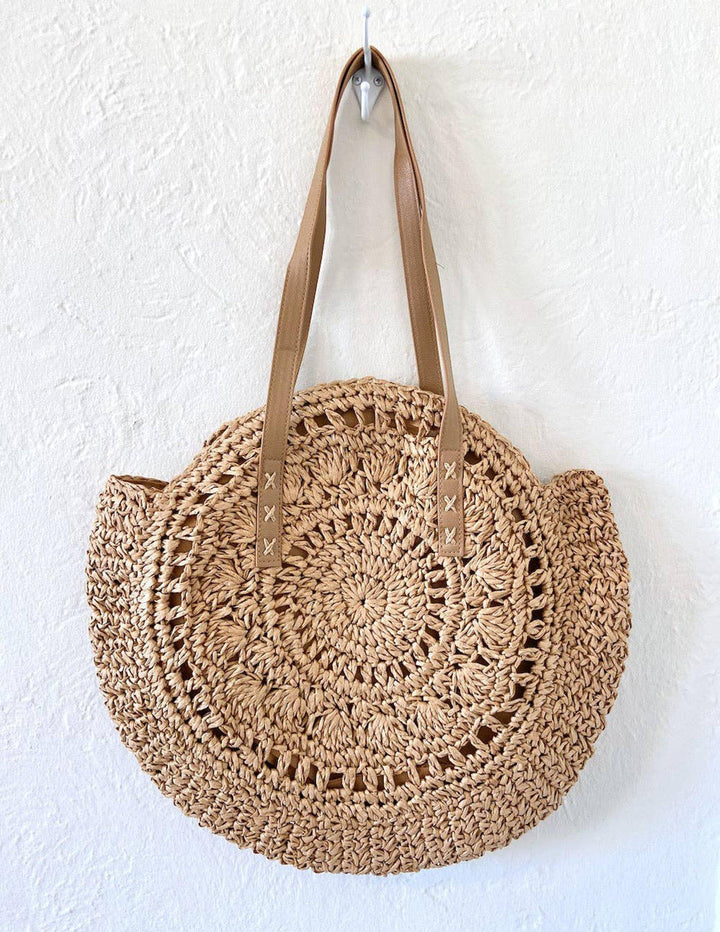 Janeth | Women’s handmade round straw tote bag with zipper closure