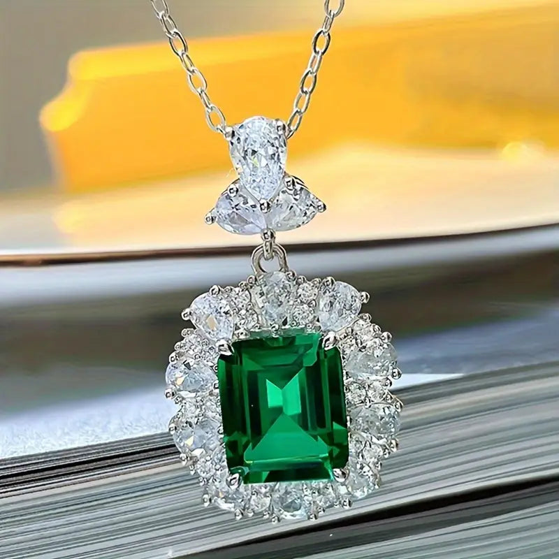 Mikha | Women’s emerald cut pendant necklace with crystal halo