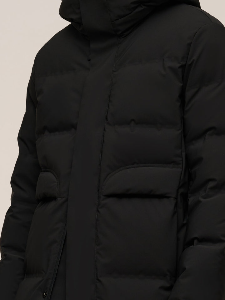 Saelyn | Women’s long hooded winter coat with a streamlined, insulated silhouette