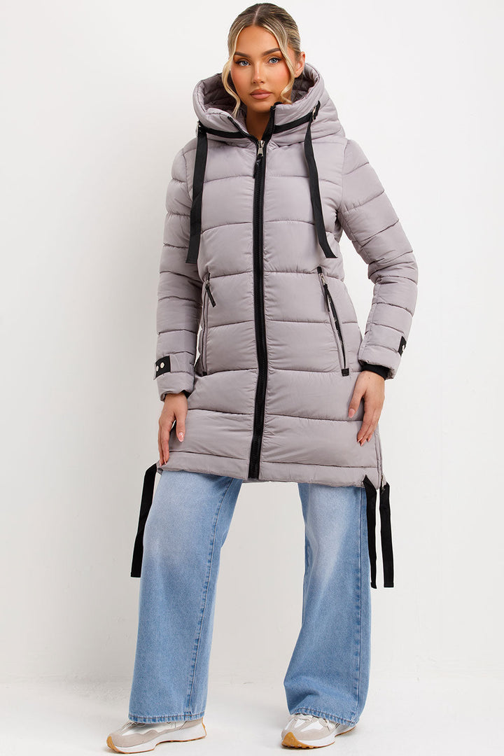 Ambriah | Women’s long puffer coat with hood and side straps