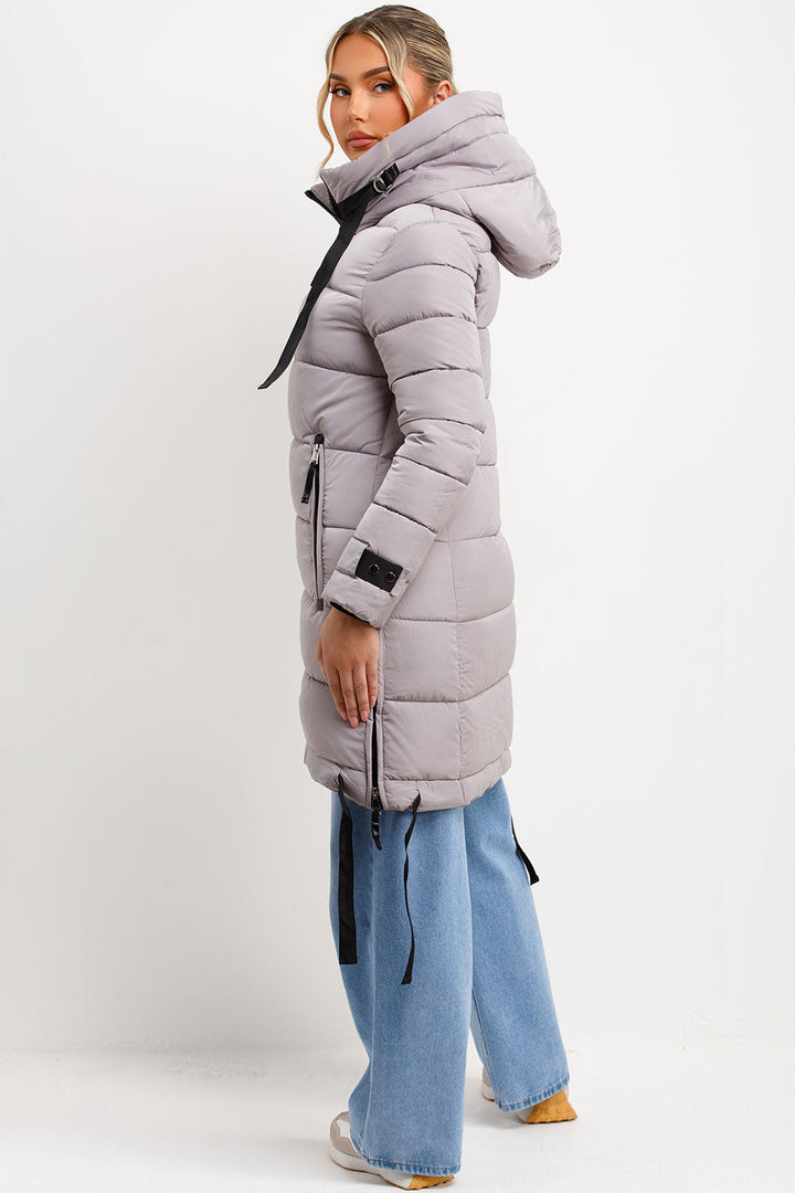 Ambriah | Women’s long puffer coat with hood and side straps