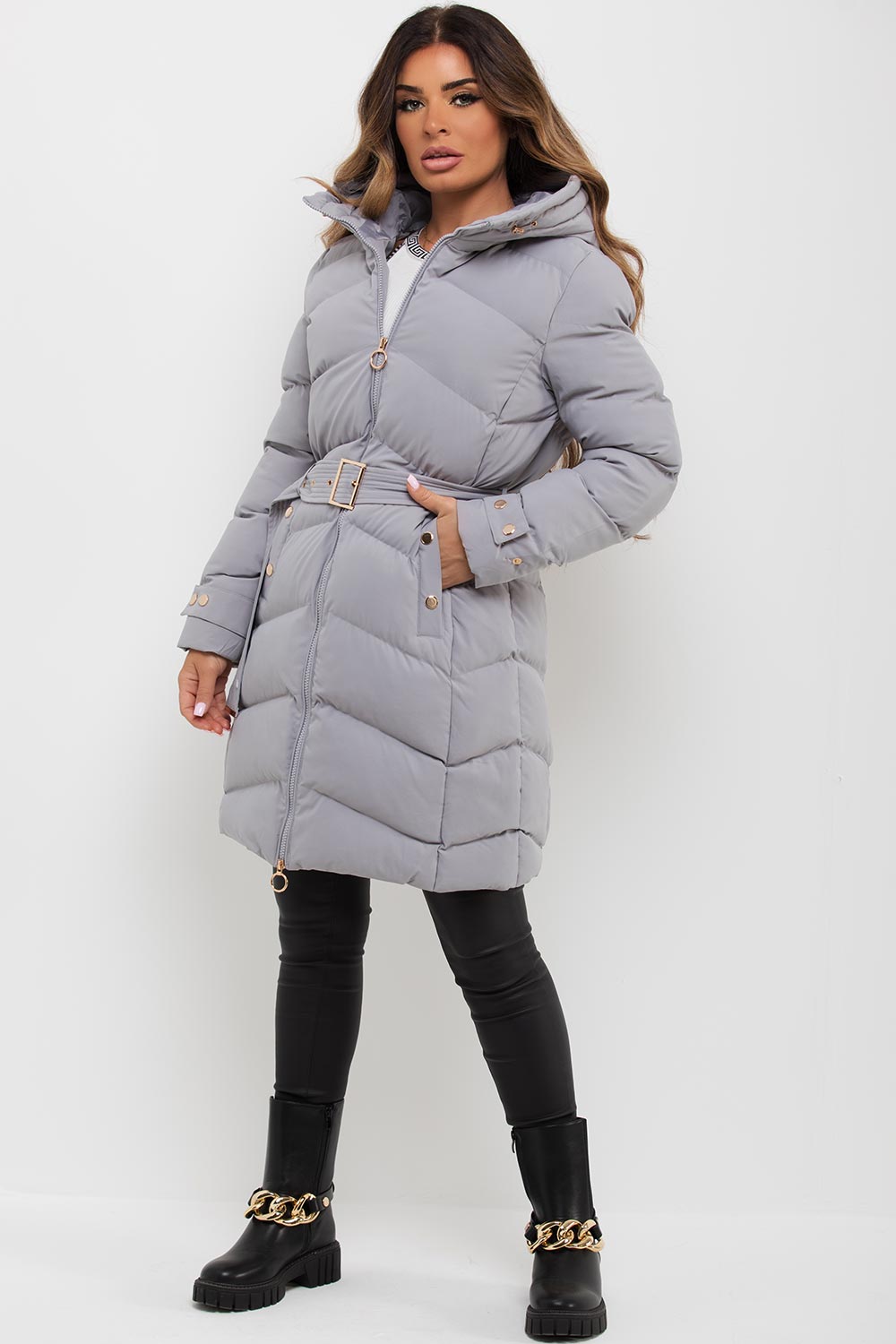 Avelina | Women’s long puffer coat with belt and gold button detail