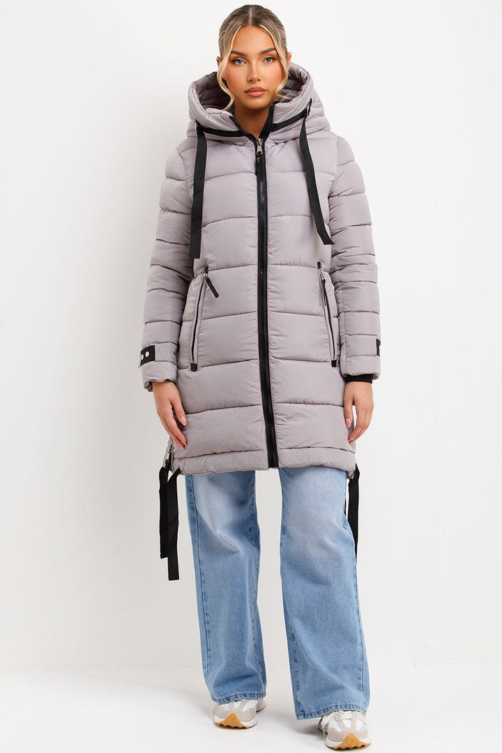 Ambriah | Women’s long puffer coat with hood and side straps