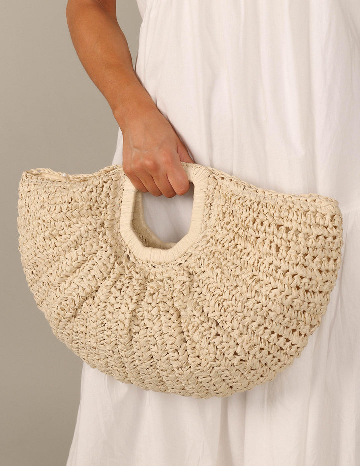 Dani | Women’s woven half-moon straw handbag